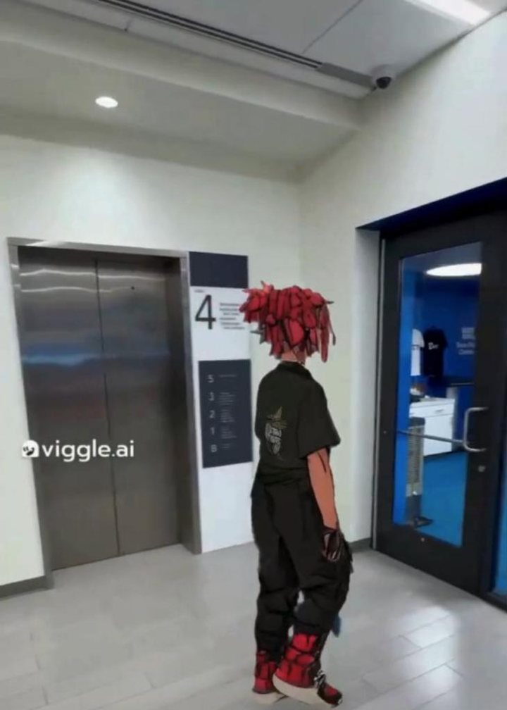 Animated character walking toward an elevator